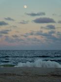 56370_229-waxing-full-moon-over-the-ocean-at-sunset-j.