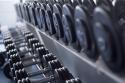 89277_shutterstock_122313685_Dumb_bells_lined_up_in_a_fitness_studio__picture_is_short_focus.